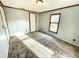 Bedroom featuring carpeted floors, a window, and neutral paint at 15616 Nc 96 Hwy, Zebulon, NC 27597