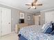 Inviting bedroom with ceiling fan and tasteful decor at 1617 Heritage Club Ave, Wake Forest, NC 27587