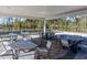 Outdoor patio area with tables and chairs for community members at 1808 Angelonia Way, Fuquay Varina, NC 27526