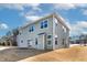 Rear view of the home highlighting the back yard and the neutral siding at 2000 Muddy Creek Ct, Raleigh, NC 27610
