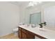 Bathroom featuring a single sink vanity, a large mirror, and a toilet at 2000 Muddy Creek Ct, Raleigh, NC 27610