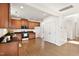 Spacious kitchen featuring wood cabinets, granite counters, and stainless steel appliances creates an inviting space at 2000 Muddy Creek Ct, Raleigh, NC 27610
