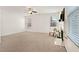 Neutral carpet and a fireplace make this living room a great blank canvas at 2000 Muddy Ct, Raleigh, NC 27610