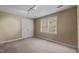Bedroom with a large closet and a large window at 2001 Carrington Dr, Raleigh, NC 27615