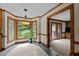 Light-filled breakfast nook with views of the backyard, and access to kitchen and living area at 2001 Carrington Dr, Raleigh, NC 27615