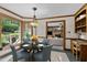 Cozy dining room featuring natural light, elegant furniture, and an inviting atmosphere at 2001 Carrington Dr, Raleigh, NC 27615