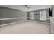 Spacious empty bedroom with carpet flooring, neutral walls, and natural light from windows at 2001 Carrington Dr, Raleigh, NC 27615