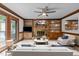 Cozy living room featuring a brick fireplace, built-in shelving, and comfortable seating at 2001 Carrington Dr, Raleigh, NC 27615