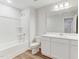 Well-lit full bathroom featuring a shower-tub combo, white cabinets, and a modern vanity at 2004 Regal Dr # 86, Durham, NC 27703