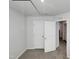 Bedroom with a closet and gray carpet, offering a simple and functional layout at 2005 Silent Bend Dr, Durham, NC 27704