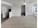 The upstairs landing features neutral carpeting and white trim with multiple doors and windows at 2005 Silent Bend Dr, Durham, NC 27704