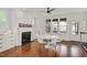 Dining area with white walls and fireplace offering lots of natural light at 2098 Great Ridge Pkwy, Chapel Hill, NC 27516
