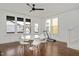 Bright dining area features hardwood floors and multiple windows with natural light at 2098 Great Ridge Pkwy, Chapel Hill, NC 27516
