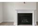 Living room fireplace with white trim and black interior at 257 Umstead St, Sanford, NC 27330