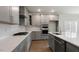 Modern kitchen with stainless steel appliances, and white countertops at 257 Umstead St, Sanford, NC 27330
