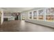Bright, open-concept living area with large windows and modern kitchen at 257 Umstead St, Sanford, NC 27330