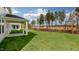 Lush backyard offers plenty of space for outdoor activities and relaxation at 273 Umstead St, Sanford, NC 27330