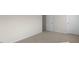 Cozy bedroom with neutral carpeting and ample natural light at 273 Umstead St, Sanford, NC 27330