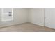 Bedroom with neutral carpet and lots of natural light at 273 Umstead St, Sanford, NC 27330