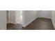 Inviting entryway featuring wood-look floors and white trim, seamlessly connecting to other living spaces at 273 Umstead St, Sanford, NC 27330