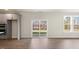 Open-concept living area featuring modern flooring and sliding doors to the outdoor space at 273 Umstead St, Sanford, NC 27330