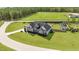 Expansive aerial view of home with a large lawn, play set and surrounding greenery at 29 Alban Row, Fuquay Varina, NC 27526
