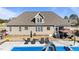 Backyard with a pool, lounge chairs, and outdoor seating area at 29 Alban Row, Fuquay Varina, NC 27526