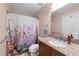 Bathroom featuring granite vanity and shower at 29 Alban Row, Fuquay Varina, NC 27526