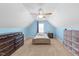 Bright bedroom with a ceiling fan and light-filled window at 29 Alban Row, Fuquay Varina, NC 27526