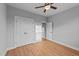 This bedroom showcases hardwood floors, neutral walls, and a closet providing ample storage at 2955 Mt Pleasant Rd, Willow Springs, NC 27592