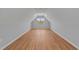 Bright bonus room with natural light and wood-look floors at 2955 Mt Pleasant Rd, Willow Springs, NC 27592