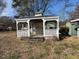 Quaint outdoor gazebo with lattice trim, perfect for relaxation and enjoying the surrounding landscape at 310 Spring St, Durham, NC 27703