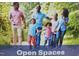 A Gathering walks through the open green spaces within the community at 322 Umstead St, Sanford, NC 27330