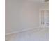 Bedroom featuring neutral walls and plush carpet with double doors at 3671 Coach Lantern Ave, Wake Forest, NC 27587