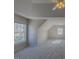 Spacious bedroom featuring a ceiling fan and ample natural light from the window at 3671 Coach Lantern Ave, Wake Forest, NC 27587