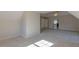 Carpeted bedroom featuring a ceiling fan and doorway to bathroom at 3671 Coach Lantern Ave, Wake Forest, NC 27587
