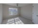 Bright bedroom featuring a ceiling fan, and a window that provides ample light at 3671 Coach Lantern Ave, Wake Forest, NC 27587