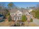 Charming two-story home boasts beautiful landscaping and inviting curb appeal at 3671 Coach Lantern Ave, Wake Forest, NC 27587