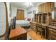 This bedroom boasts hardwood floors, natural light, and a wooden writing desk at 41 E T Hanner Rd, Bear Creek, NC 27207