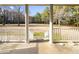 Inviting view from the covered porch, overlooking a spacious yard filled with mature trees at 41 E T Hanner Rd, Bear Creek, NC 27207