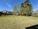 View of the backyard with nice lawn at 429 Teague St, Wake Forest, NC 27587