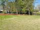 View of the backyard with nice lawn at 429 Teague St, Wake Forest, NC 27587