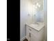 Modern bathroom featuring a stylish vanity with a marble countertop and sleek fixtures at 429 Teague St, Wake Forest, NC 27587