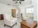 Spacious bonus room featuring vaulted ceilings, lots of natural light, and comfortable furnishings at 429 Teague St, Wake Forest, NC 27587