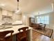 Bright kitchen featuring a spacious island, modern appliances, and a dining area at 429 Teague St, Wake Forest, NC 27587
