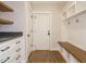 Convenient mudroom with bench seating, cubbies, and built-in cabinets at 429 Teague St, Wake Forest, NC 27587