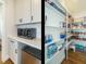 Pantry with lots of shelves and a countertop with microwave at 429 Teague St, Wake Forest, NC 27587