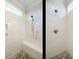 Beautiful tile shower with river rock floor at 429 Teague St, Wake Forest, NC 27587