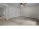 Neutral bedroom featuring two double door closets and carpeted floors at 4705 Bernie Pl, Raleigh, NC 27616