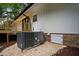Exterior view with a wooden deck and an HVAC system placed near the foundation at 4705 Bernie Pl, Raleigh, NC 27616